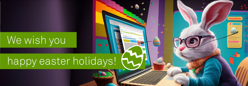 A white Easter bunny sits at a laptop. On green bars it says in white letters: "We wish you happy Easter holidays!"
